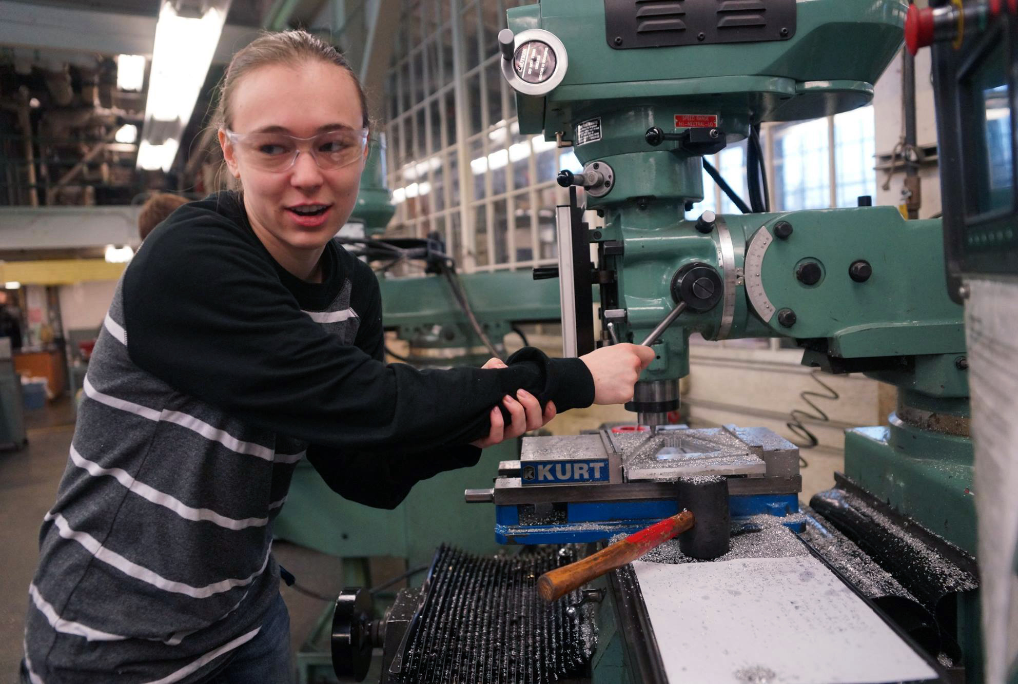 Sylvie Troxel, now in her fourth year as a UW EcoCAR member, works on mechanical components near the end of last year's competition.