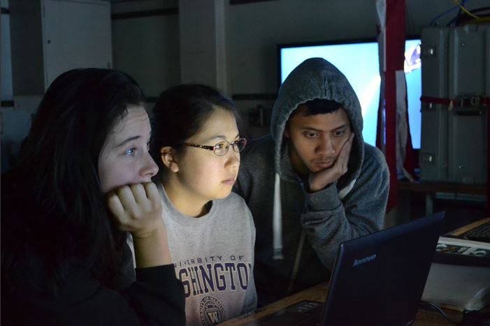 students watching screen