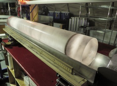 This image from December 2010 shows a 1-meter-long section of the West Antarctic Ice Sheet Divide core with a dark ash layer.