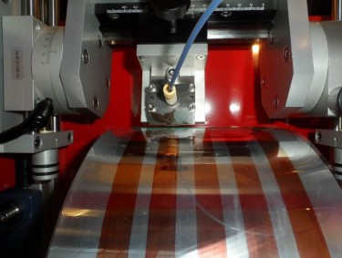 Photovoltaic inks are used to print solar cells on a bench-top roll-to-roll coater at the UW.