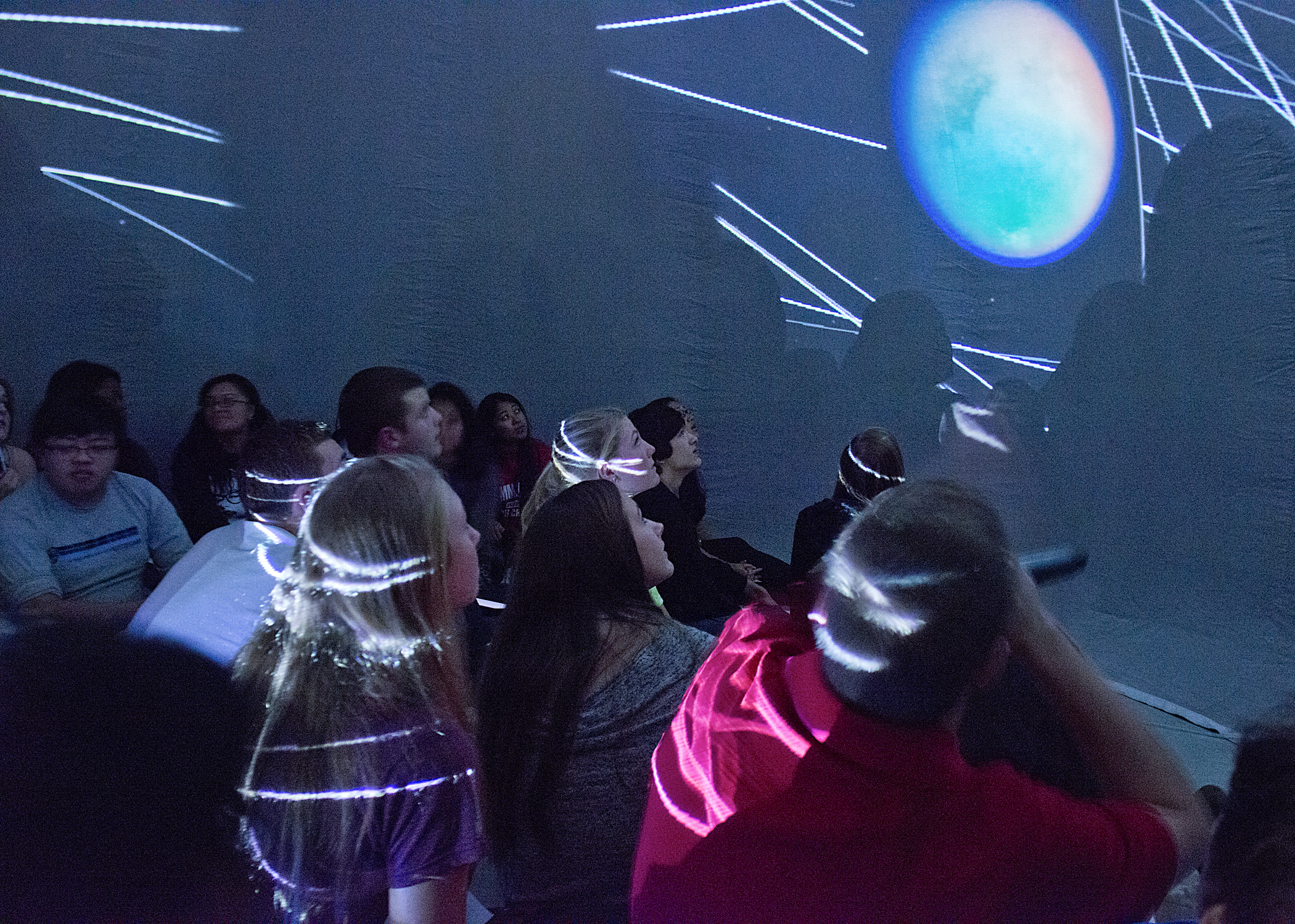 Students at Bellevue's Sammamish High School take turns giving presentations in the UW Astronomy Department's mobile planetarium. Last school year, 1,700 students sat for shows in the traveling dome, and about 100 of them -- form elementary school to high school -- gave planetarium presentations of their own.
