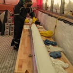 photo of person in tent bending over ice core