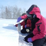 person cutting snow