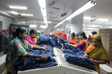Workers in an apparel company in Dhaka, Bangladesh, in December 2014.