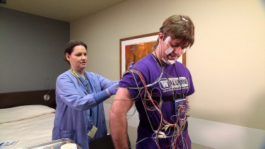 Doctors use a polysomnography test - which requires a patient to sleep overnight in a hospital or clinic while hooked up to dozens of sensors - to diagnose sleep apnea.