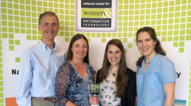 UW Department of Computer Science & Engineering’s Ed Lazowska, Crystal Eney, Allison Obourn, and Ruth Anderson with the National Center for Women & Information Technology NEXT Award Grand Prize trophy.