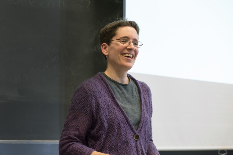 Sarah Elwood talks with her GIS Workshop class, which is using data skills to help local nonprofits.