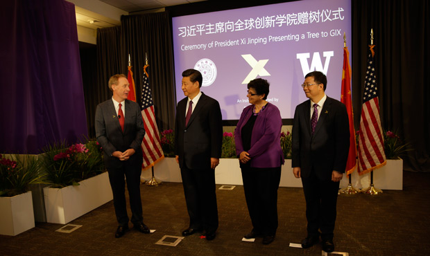 Microsoft President Brad Smith, Chinese President Xi Jinping, UW Interim President Ana Mari Cauce and Tsinghua President Qiu Yong at the presentation of a dawn redwood tree to the Global Innovation Exchange by President Xi.