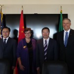 From left: Wang Dongming, Ana Mari Cauce, Qiu Yong and Jay Inslee at the signing ceremony Sept. 22.