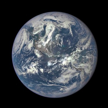 The Earth as seen by the Polychromatic Imaging Camera aboard NASA's Deep Space Climate Observatory satellite, July 2015. Recent research by UW grad student Edward Schwieterman shows that observations of nitrogen in Earth's atmosphere from afar might help astronomers detect the "invisible" gas in the atmospheres of planets beyond our solar system.