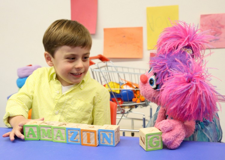 "Sesame Street" character Abby Cadabby, right, is part of the new See Amazing in All Children campaign.