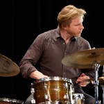 Image of Ted Poor playing a drumset