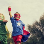 stock photo of children dressed as superheroes