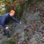 person standing in mud