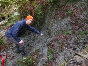 person standing in mud