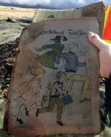 old newspaper clipping in landfill