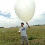 person with weather balloon