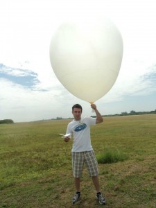 person with weather balloon
