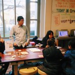 people playing a board game