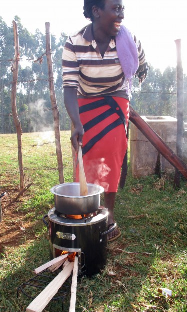 Photo of woman testing stove in Kenya