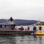 Preparing to launch the new buoy, named Se’lhaem, in Bellingham Bay.