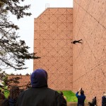 Rachael Lincoln, UW dance lecturer and member of the BANDALOOP dance company, performs "Man Walking Down the Side of a Building," by choreographer Trisha Brown on the west side of Meany Hall for the Performing Arts on Friday, Feb. 5. She was assisted from above by a colleague with BANDALOOP.