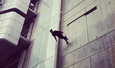 BANDALOOP performs their vertical choreography on the side of Meany Hall, February 5.