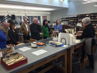 Visitors learn about UW Libraries' new Conservation Center, in Suzzallo Library, during an April Friends of the Library tour.