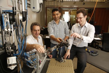 The research team from the UW Movement Control Laboratory includes (left to right) Emo Todorov, associate professor of computer science and engineering and of applied mathematics; Vikash Kumar, doctoral student in computer science and engineering; and Sergey Levine, assistant professor of computer science and engineering.