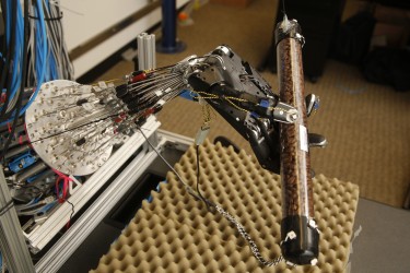 This five-fingered robot hand can learn how to perform dexterous manipulation — like spinning a tube full of coffee beans — on its own, rather than having humans program its actions.
