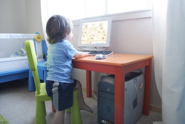 picture of child using computer