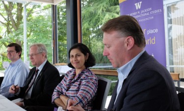 Saadia Pekkanen, Job and Gertrud Tamaki Professor and associate director of the UW's Jackson School of International Studies, chairs a capstone meeting for junior fellows of the school's Space Security Initiative Wednesday, June 8, at the University of Washington Club. From left, others are: Kristian Ulrichsen, affiliate professor of international studies; Alan Boyle, journalist with GeekWire; and John Thornquist, director of the Office of Aerospace for the Washington State Department of Commerce.