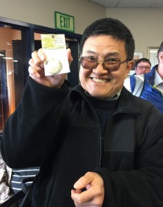 person showing medal
