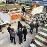 People standing in the vacant lot