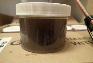 jar with brown liquid