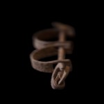 Charles Johnson, UW professor emeritus of English, was asked to write a statement to accompany an item to be displayed in the new National Museum of African American History and Culture in Washington, D.C. The item is an iron slave shackle from the 19th century, and the photo -- by Wendel A. White -- depicts that.