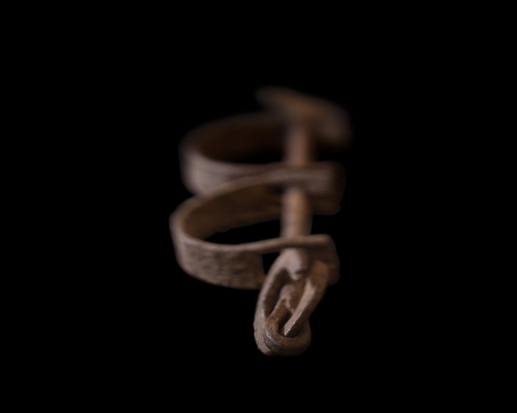 Charles Johnson, UW professor emeritus of English, was asked to write a statement to accompany an item to be displayed in the new National Museum of African American History and Culture in Washington, D.C. The item is an iron slave shackle from the 19th century, and the photo -- by Wendel A. White -- depicts that.