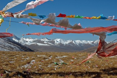 Buddhist flags blowing in wind