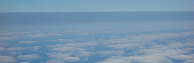 The dark blue band at the top is a smoke layer above the clouds, as seen from the research aircraft.