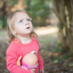 Little girl looking up with concerned look