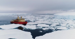 ship surrounded by ice