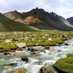 river flowing through mountain valley