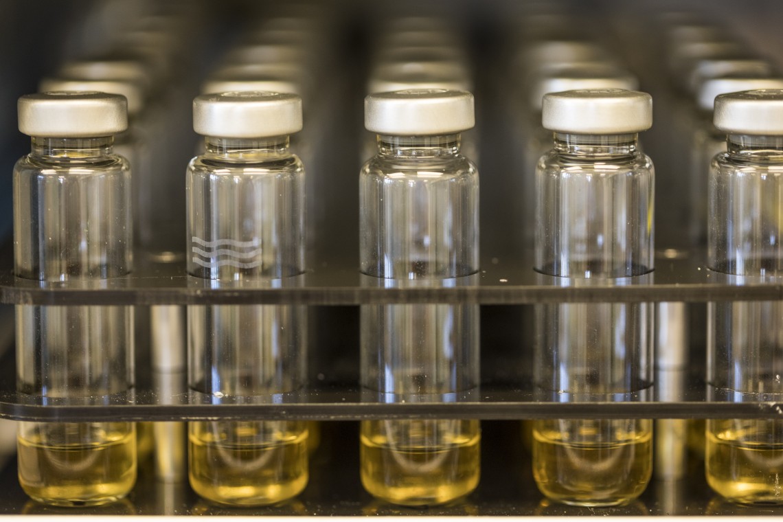 yellow liquid in vials