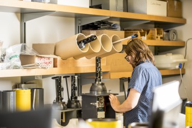 person facing workbench