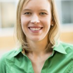A professor smiling
