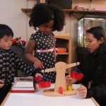 Children work with a teacher at an early learning facility that partners with Cultivate Learning (formerly the UW Childcare Quality & Early Learning Center for Research and Professional Development).