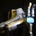 photo of robot arm with skin on finger