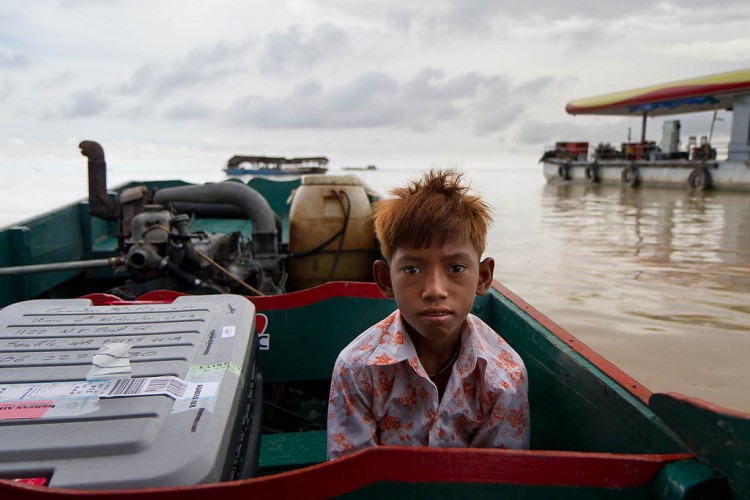 young fisher waits