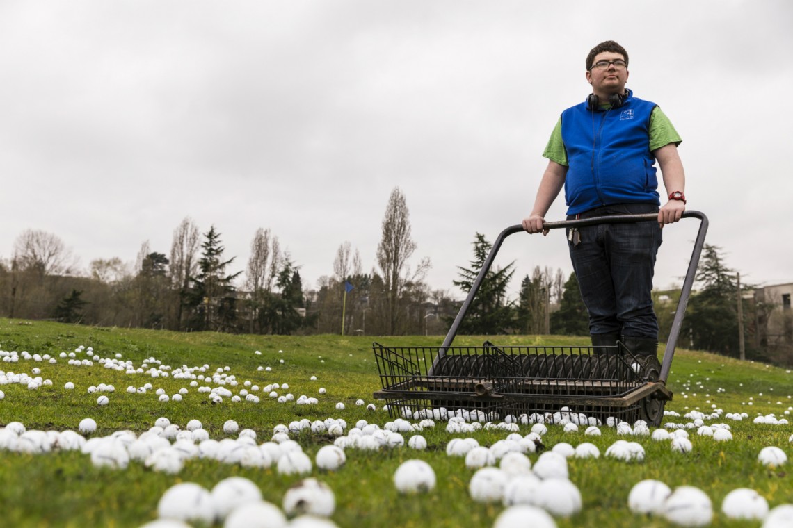 Matthew Skelly, an intern with project SEARCH, retrieves golf balls four mornings a week at the UW driving range. "In middle school, my dream job was to be a bus driver," Skelly explained. "Then I decided I wanted to be a flight attendant. This program helped me learn what else I might want to do for a job."