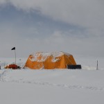 yellow tent on snow